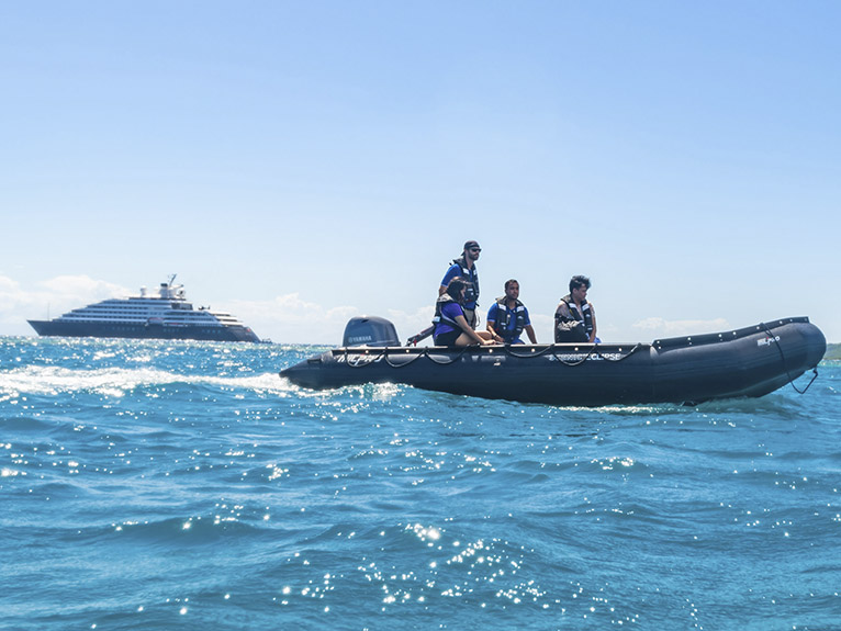 Discovery Team making an excursion in front of Scenic Eclipse