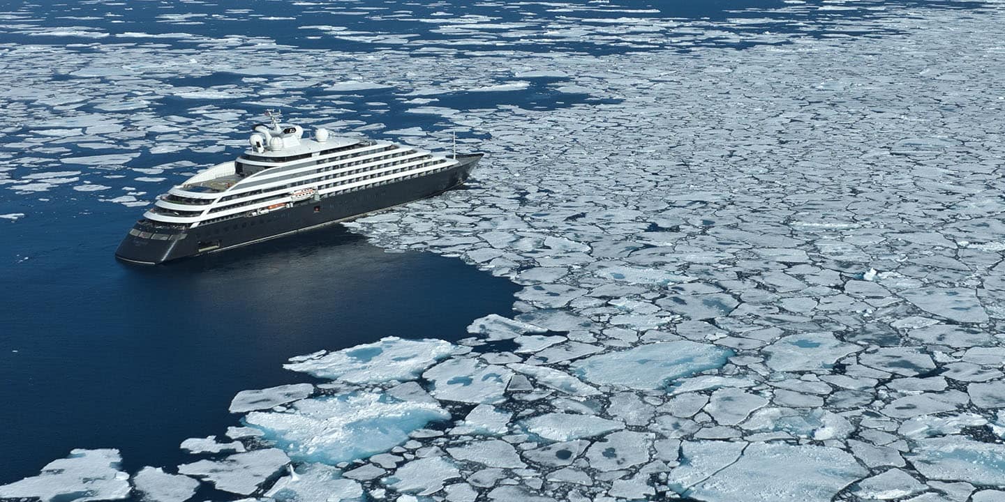 Scenic Eclipse in Northwest Passage voyage in midst of ice floes