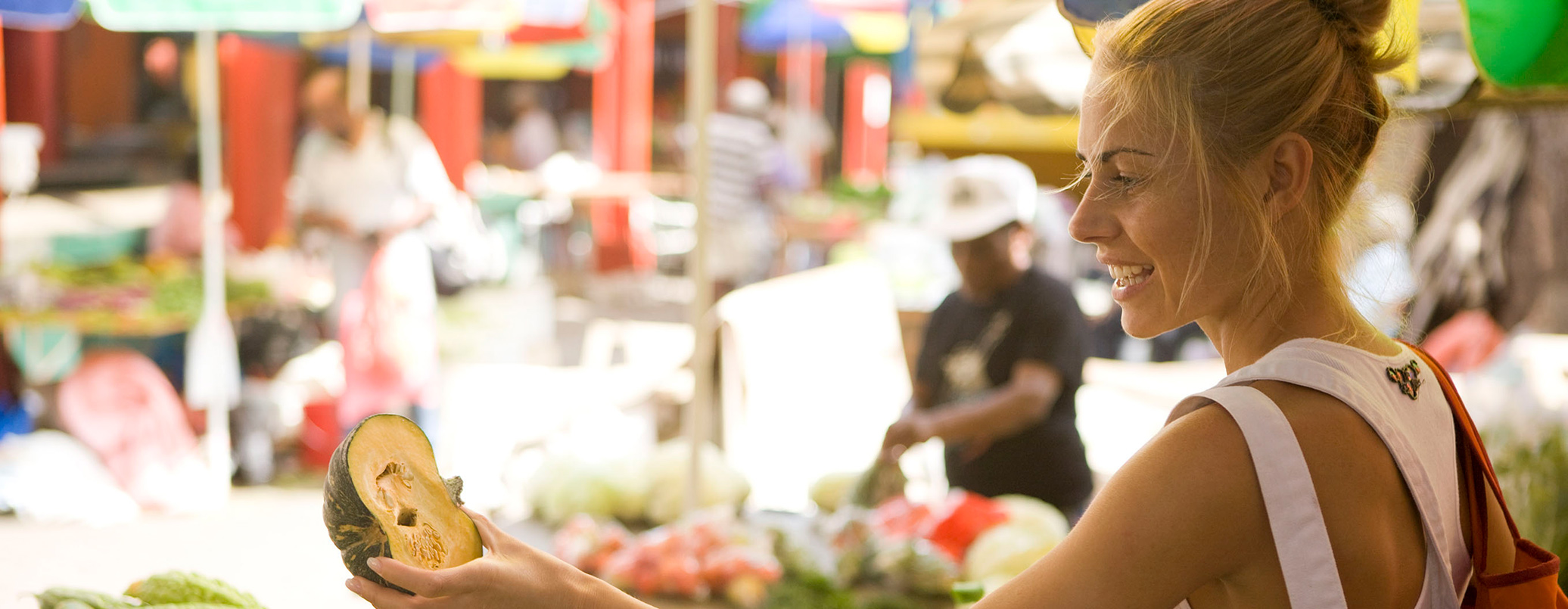 Solo traveller at colourful outdoor market
