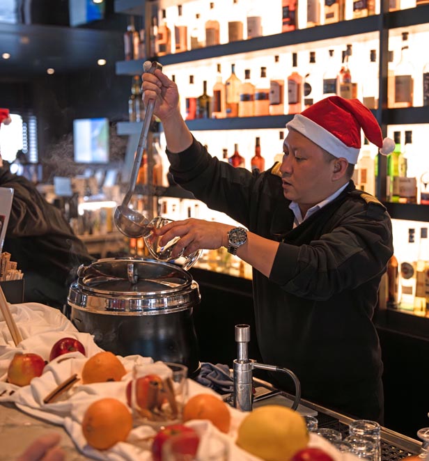 Scenic Eclipse bartender at Christmas
